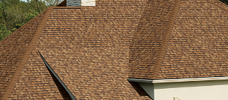 Home roof installation, brown shingle